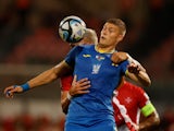 Ukraine's Artem Dovbyk in action with Malta's Enrico Pepe on October 17, 2023