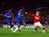 Chelsea's Axel Disasi in action with Manchester United's Alejandro Garnacho on April 4, 2024