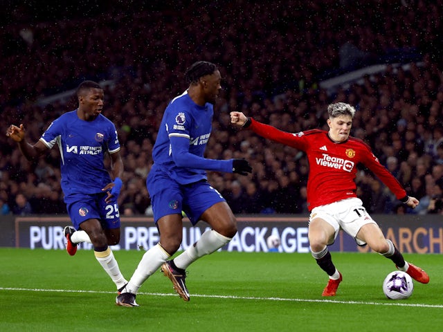 Chelsea's Axel Disasi in action with Manchester United's Alejandro Garnacho on April 4, 2024