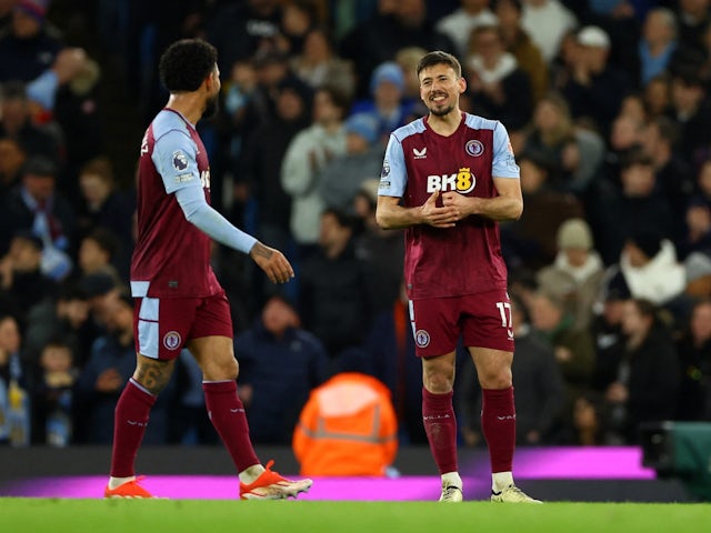 Aston Villa's Clement Lenglet looks dejected after Manchester City scores their third goal on April 3, 2024