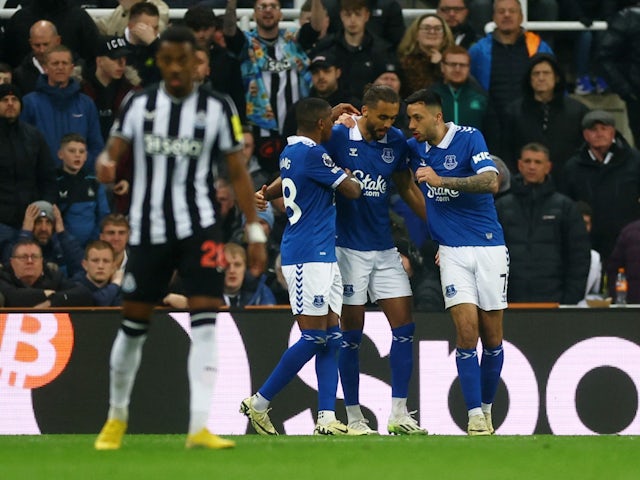 Everton's Dominic Calvert-Lewin celebrates scoring their first goal with Ashley Young and Dwight McNeil on April 2, 2024