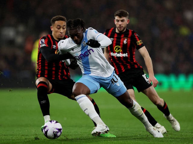 Crystal Palace's Eberechi Eze in action with AFC Bournemouth's Marcus Tavernier on April 2, 2024