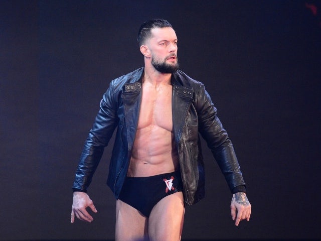 Finn Balor enters the arena during WWE Raw at Barclays Center on November 22, 2021