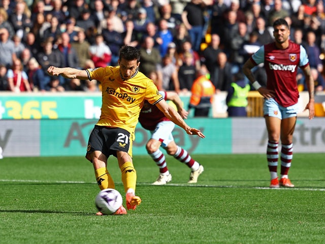 Wolverhampton Wanderers' Pablo Sarabia scores their first goal on April 6, 2024
