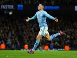 Manchester City's Phil Foden celebrates scoring their second goal on April 3, 2024