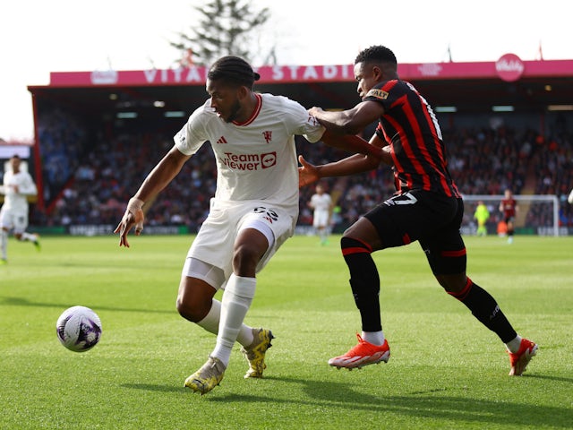 Manchester United's Willy Kambwala in action with Bournemouth's Luis Sinisterra on April 13, 2024