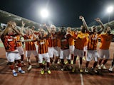 Galatasaray players celebrate winning the Turkish Super Cup final after Fenerbahce players walked off leading to the match being abandoned on April 7, 2024