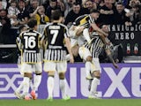 Juventus' Federico Gatti celebrates scoring their first goal with Dusan Vlahovic on April 7, 2024