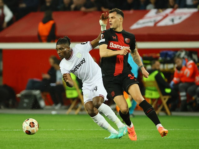 West Ham United's Mohammed Kudus in action with Bayer Leverkusen's Granit Xhaka on April 11, 2024