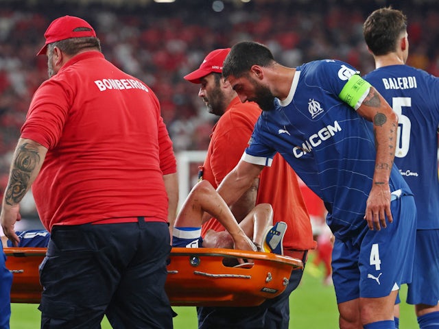 Marseille's Quentin Merlin is stretchered off the pitch after sustaining an injury on April 11, 2024