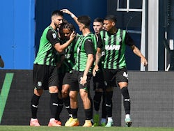 Sassuolo's Armand Lauriente celebrates scoring their second goal with teammates on April 14, 2024