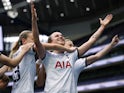 Tottenham Hotspur Women's Martha Thomas celebrates scoring their second goal with teammates on April 14, 2024