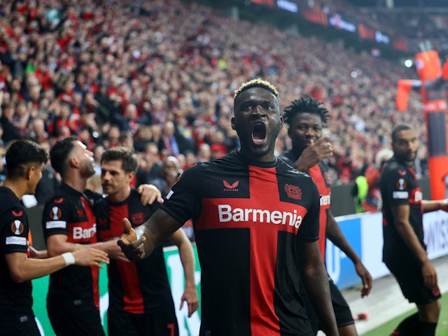 Bayer Leverkusen's Victor Boniface celebrates scoring their second goal on April 11, 2024