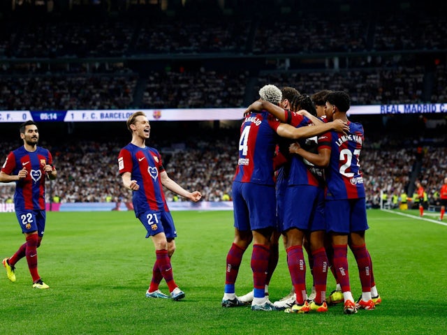 Barcelona's Andreas Christensen celebrates scoring their first goal with teammates on April 21, 2024
