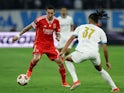 Benfica's Angel Di Maria in action with Marseille's Emran Soglo on April 18, 2024