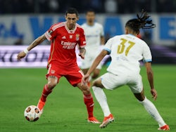 Benfica's Angel Di Maria in action with Marseille's Emran Soglo on April 18, 2024