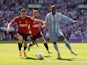 Coventry City's Haji Wright in action with Manchester United's Diogo Dalot and Bruno Fernandes on April 21, 2024