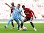 Manchester United's Marcus Rashford in action with Coventry City's Josh Eccles on April 21, 2024