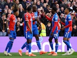 Crystal Palace's Jean-Philippe Mateta celebrates scoring their fifth goal with Naouirou Ahamada and Michael Olise on April 21, 2024
