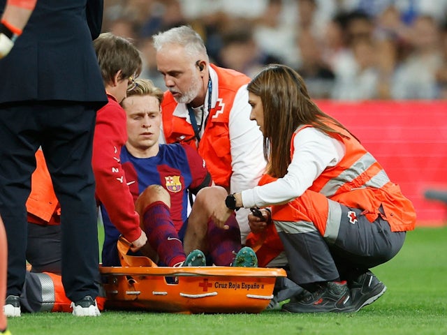 Barcelona's Frenkie de Jong receives medical attention after sustaining an injury on April 21, 2024