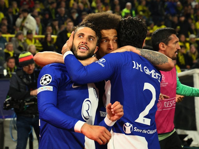 Atletico Madrid's Koke, Jose Gimenez and Axel Witsel celebrate their first goal an own goal scored by Borussia Dortmund's Mats Hummels on April 16, 2024