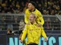 Borussia Dortmund's Julian Brandt celebrates scoring their first goal with Jadon Sancho on April 16, 2024