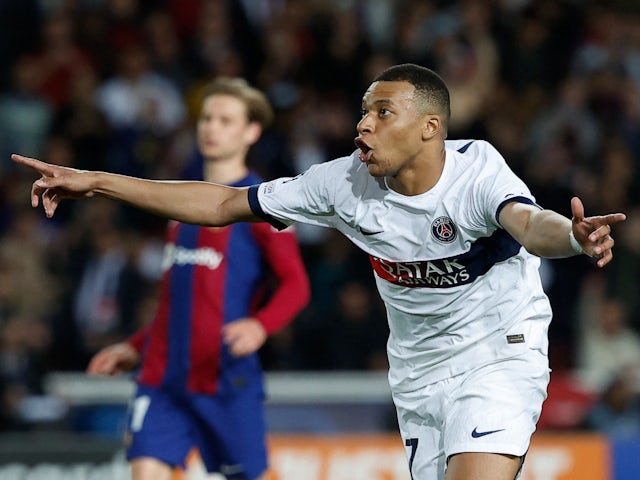Paris Saint-Germain's Kylian Mbappe celebrates scoring their third goal on April 16, 2024