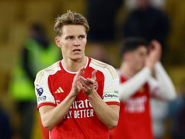 Arsenal's Martin Odegaard celebrates after the match on April 20, 2024