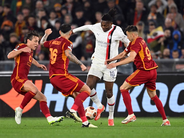 AC Milan's Rafael Leao in action with AS Roma's Stephan El Shaarawy on April 18, 2024