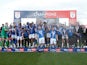 Stockport County's Paddy Madden and Ryan Croasdale lift the trophy as they celebrate with teammates after winning League Two on April 20, 2024