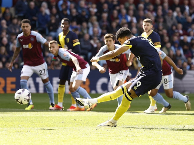 Bournemouth's Dominic Solanke scores a penalty against Aston Villa on April 21, 2024