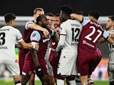 West Ham United and Bayer Leverkusen players clash on April 18, 2024