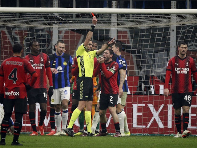 AC Milan's Davide Calabria is shown a red card by referee Andrea Colombo on April 22, 2024