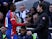 Crystal Palace's Eberechi Eze shakes hands with manager Oliver Glasner after being substituted on March 2, 2024