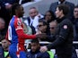 Crystal Palace's Eberechi Eze shakes hands with manager Oliver Glasner after being substituted on March 2, 2024