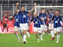 Inter Milan's Francesco Acerbi celebrates scoring their first goal with teammates on April 22, 2024