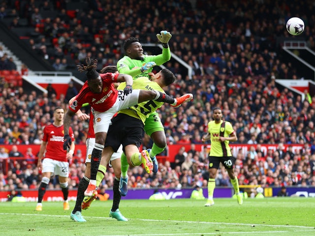 Manchester United's Andre Onana fouls Burnley's Zeki Amdouni to concede a penalty on April 27, 2024