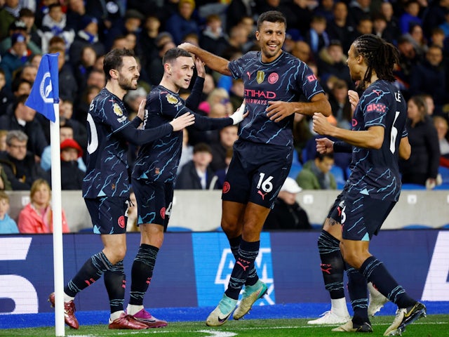 Manchester City's Phil Foden celebrates scoring their second goal with Bernardo Silva, Rodri and Nathan Ake on April 25, 2024