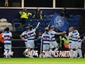 Queens Park Rangers' Lucas Andersen celebrates scoring their second goal with teammates on April 26, 2024