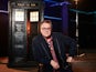 Doctor Who boss Russell T Davies in front of the TARDIS