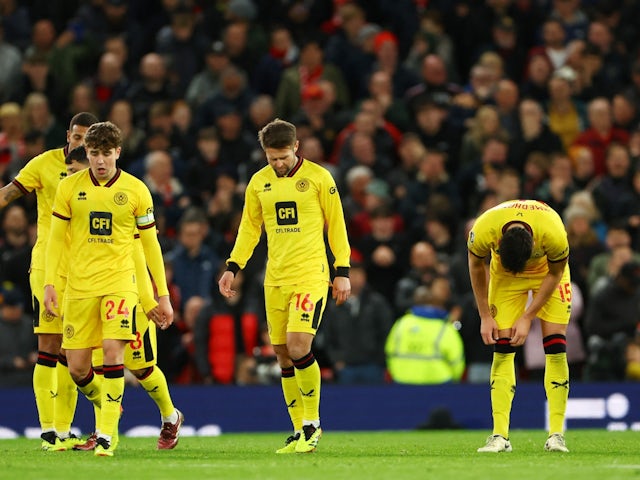 Sheffield United players look dejected after conceding their third goal on April 24, 2024