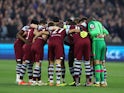 West Ham United players huddle before the match on April 18, 2024