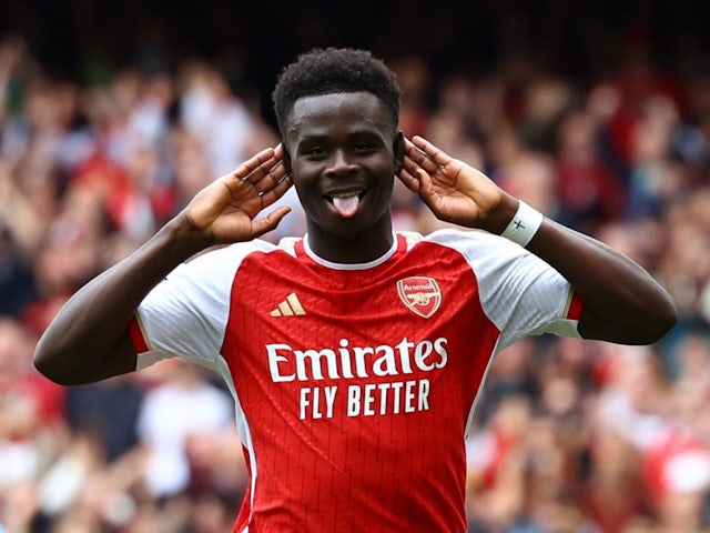 Arsenal's Bukayo Saka celebrates scoring their first goal on May 4, 2024