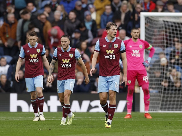 Burnley's Josh Brownhill and Sander Berge looks dejected on May 4, 2024