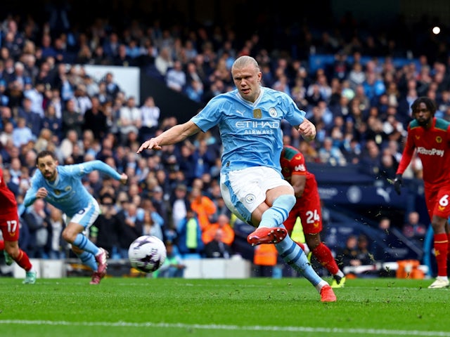 Manchester City's Erling Haaland scores their first goal from the penalty spot on May 4, 2024