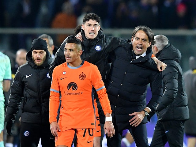 Inter Milan coach Simone Inzaghi and Alexis Sanchez celebrate after the match on January 28, 2024