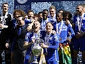 Leicester City's Jamie Vardy and Marc Albrighton lift the trophy with teammates after winning the Championship on May 4, 2024