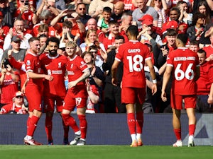 Liverpool stave off Spurs fightback to keep title race alive