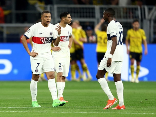 Paris Saint-Germain's Kylian Mbappe looks dejected after Borussia Dortmund's Niclas Fullkrug scores their first goal on May 1, 2024