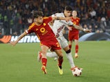 Roma's Paulo Dybala in action with Bayer Leverkusen's Piero Hincapie on May 2, 2024